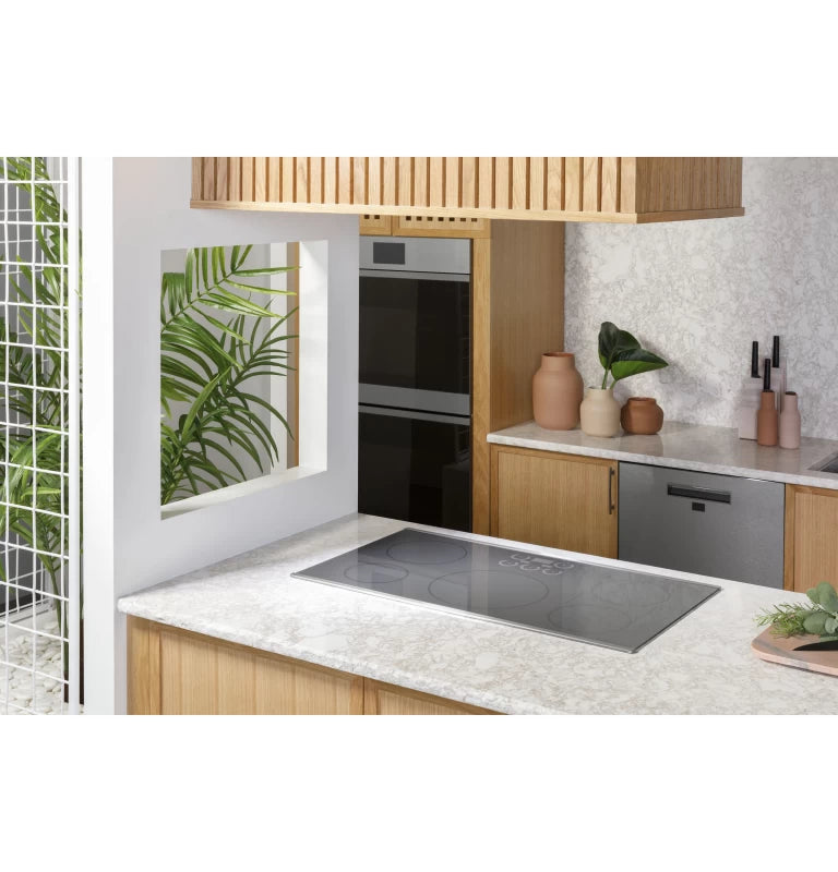 CAFE Series ENERGY STAR® 30" Built-In Touch Control Induction Cooktop - Black (CHP90301TBB)