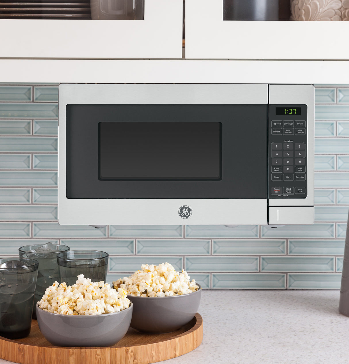 GE 0.7 Cu. Ft. Spacemaker Countertop Microwave Oven - White (GCHK07N1WSS)