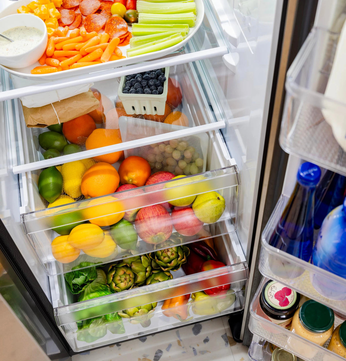 GE  23.5 Cu. Ft. Counter-Depth Side-By-Side Refrigerator with LED Light Walls and Extra Tall Dispenser - Fingerprint Resistant Stainless (GZS24PYYFS)