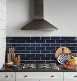 GE 30" Built-In Gas Cooktop with Dishwasher-Safe Grates - Stainless Steel (JGP3030SLSS)